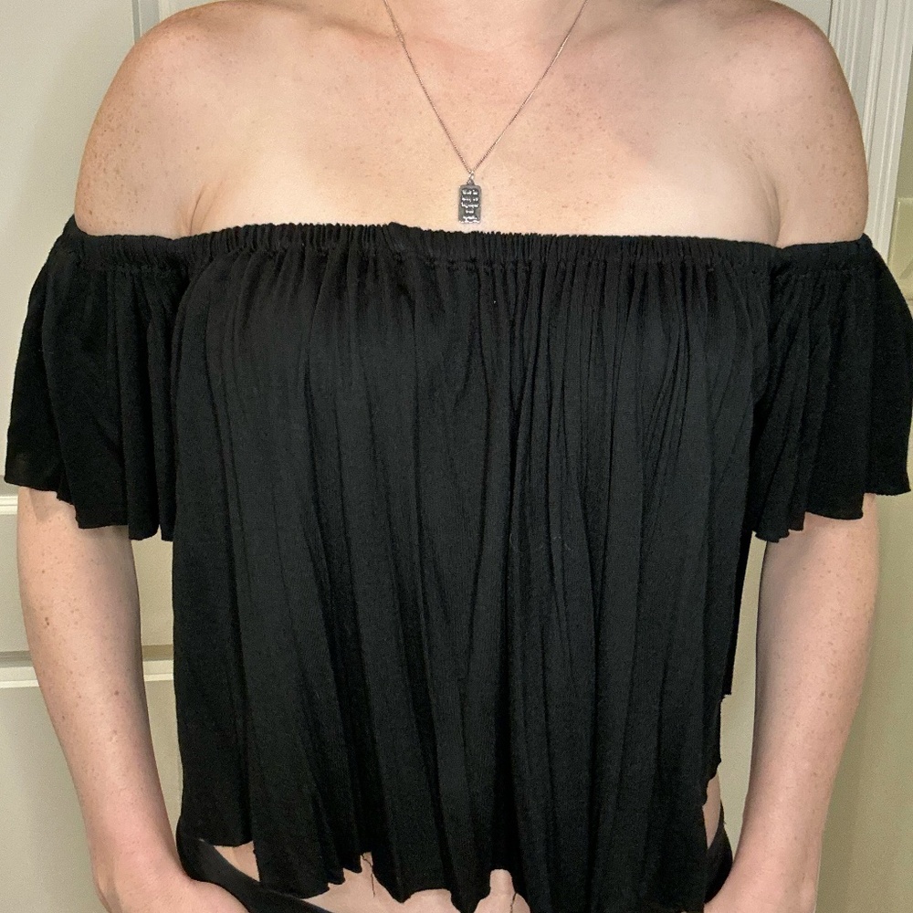 Black off the shoulder loose fitting top size M